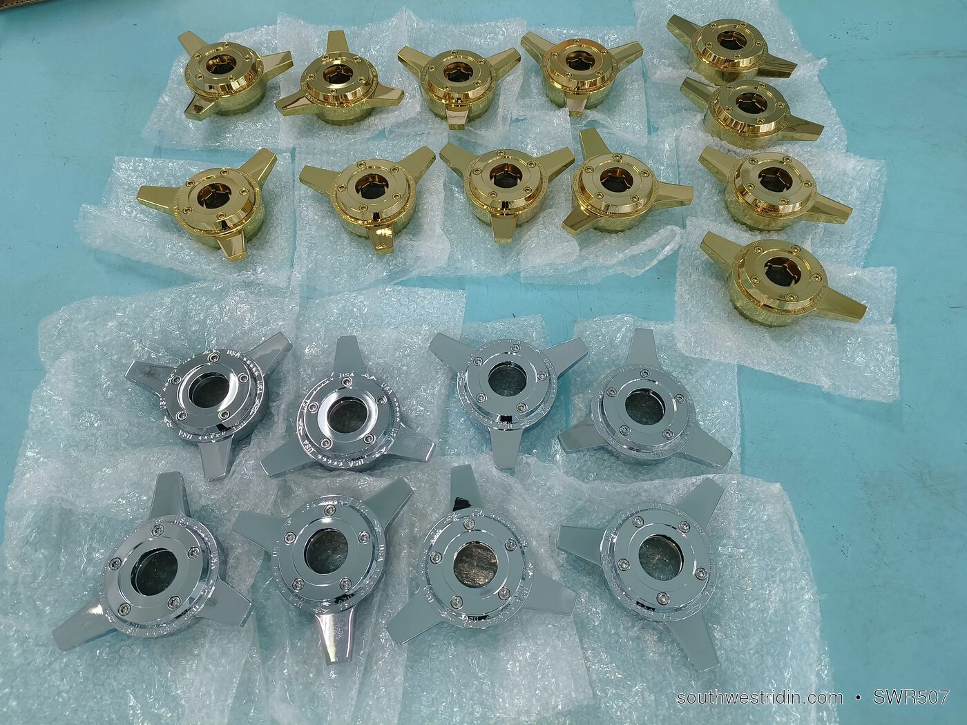 Gold and chrome lowrider wire wheel knockoffs