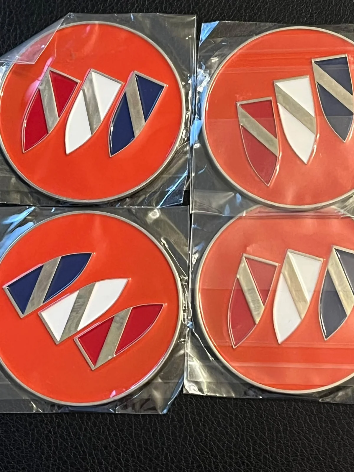 Buick — red lowrider wire-wheel chips