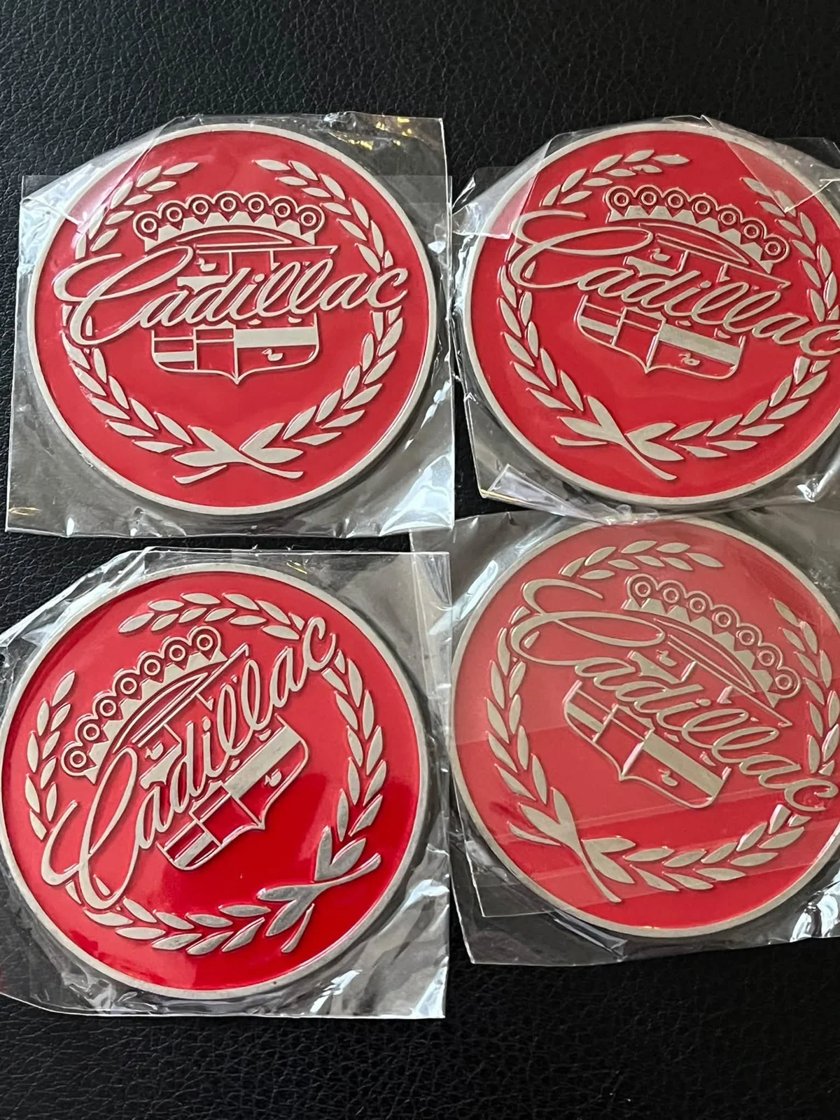 Cadillac script — red lowrider wire-wheel chips