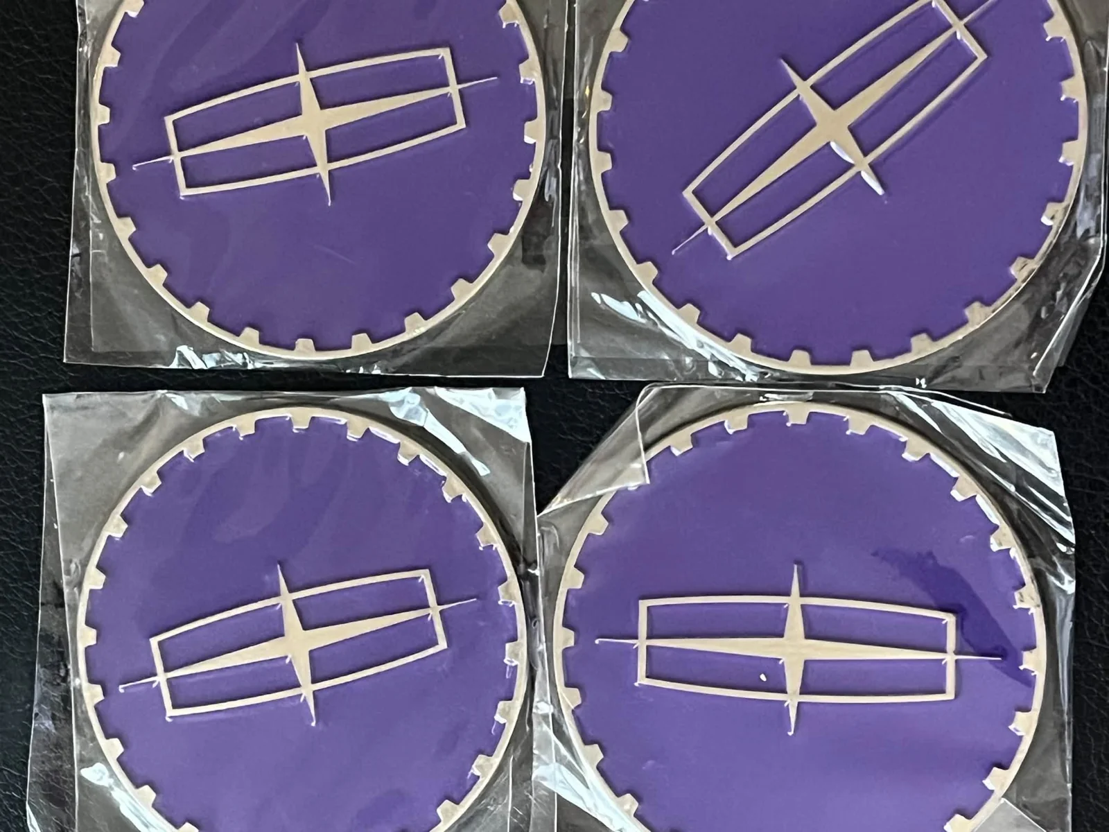 Lincoln — purple lowrider wire-wheel chips